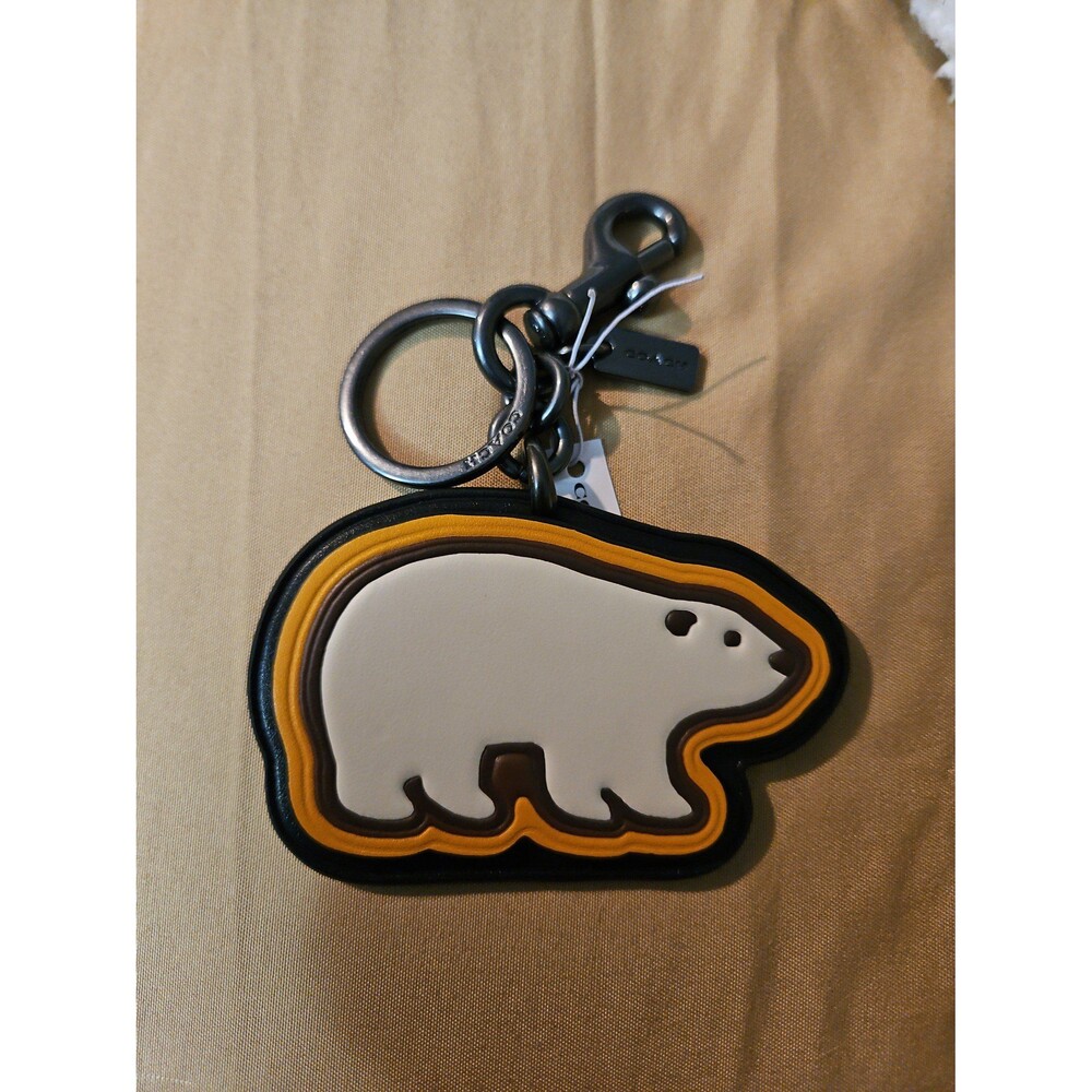 Coach charm